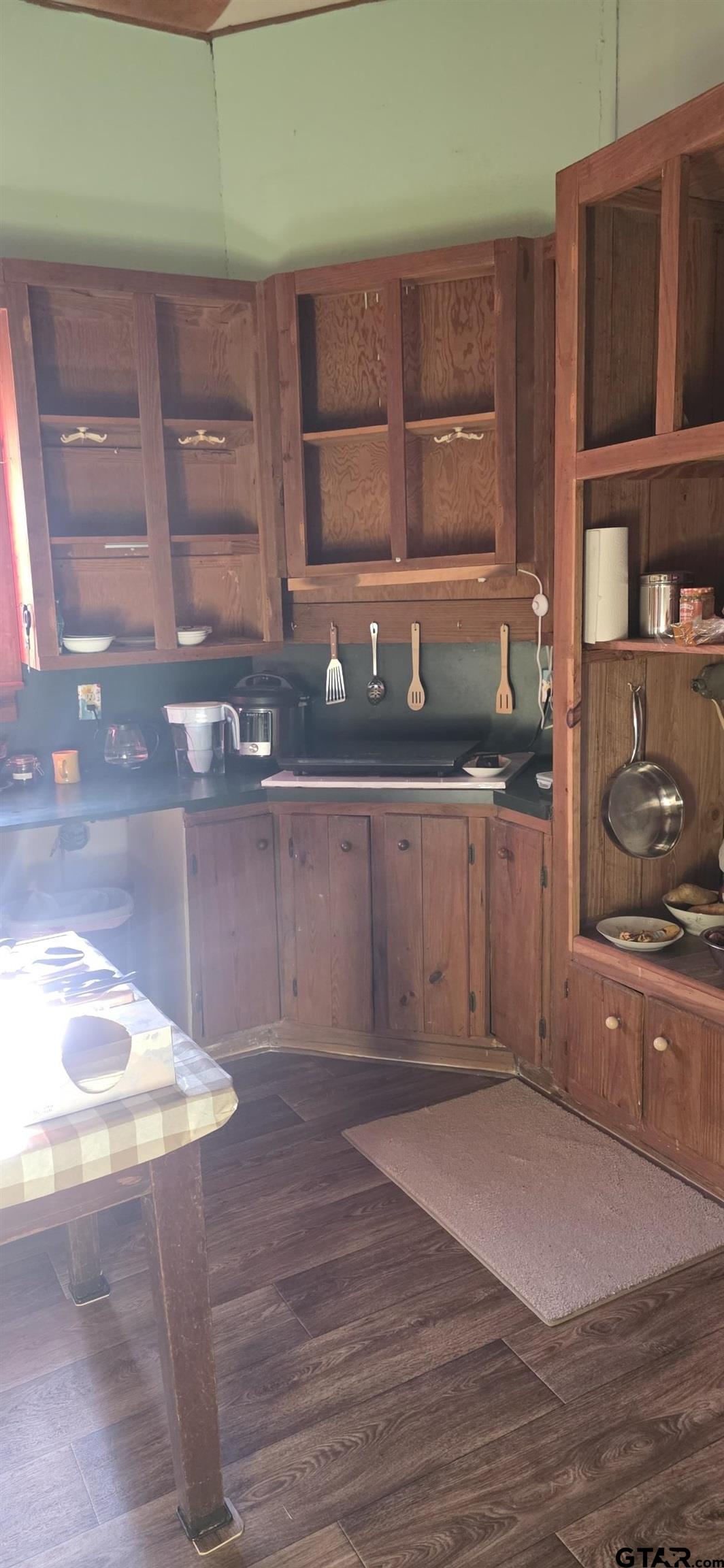 632 Highway 7 Pollok, TX 75969 - Photo 12 of 27 a view of a kitchen cabinets and wooden floor