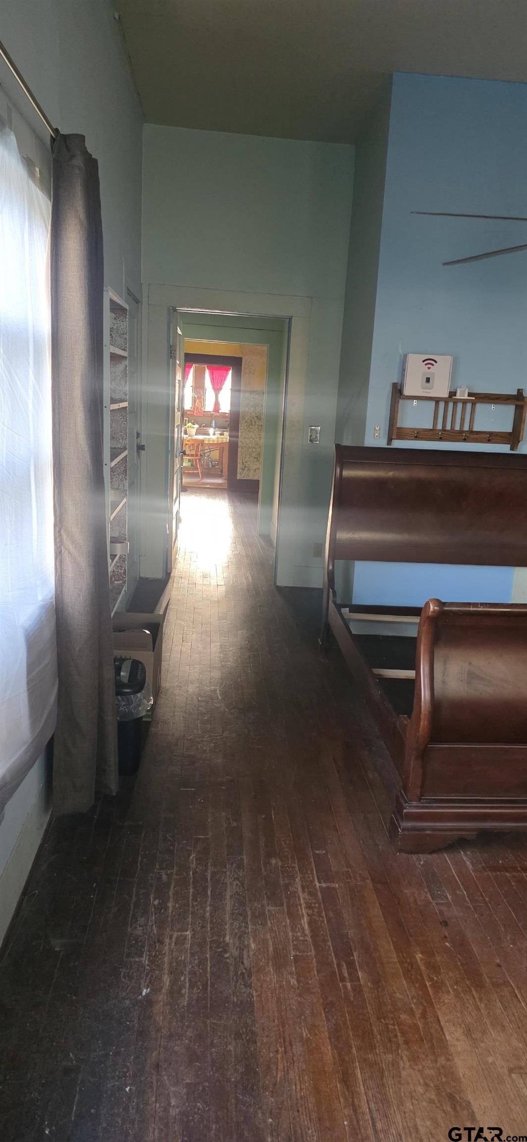 632 Highway 7 Pollok, TX 75969 - Photo 15 of 27 a room with a walk in closet and a window