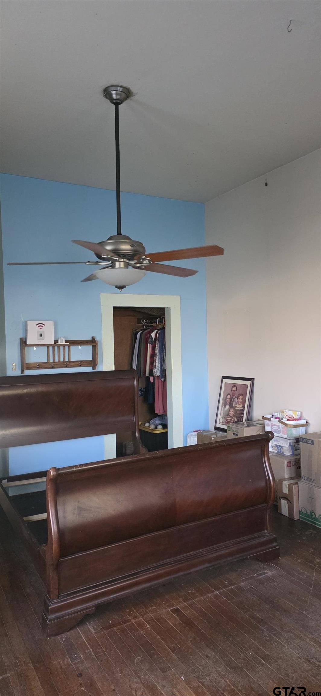 632 Highway 7 Pollok, TX 75969 - Photo 16 of 27 a bedroom with furniture and a chandelier