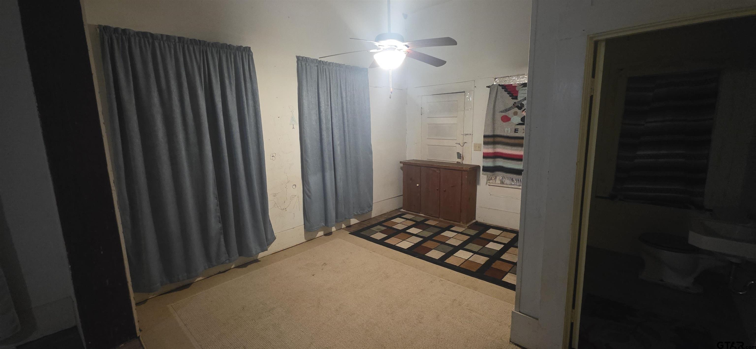 632 Highway 7 Pollok, TX 75969 - Photo 24 of 27 a bedroom with closet and furniture