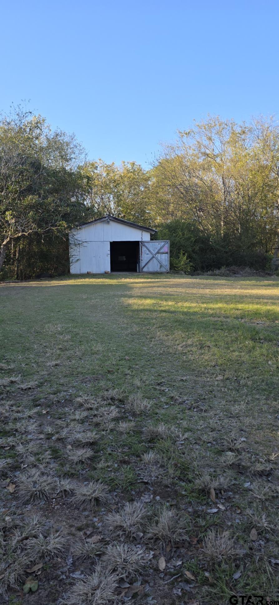 632 Highway 7 Pollok, TX 75969 - Photo 4 of 27 a view of a yard with a mountain