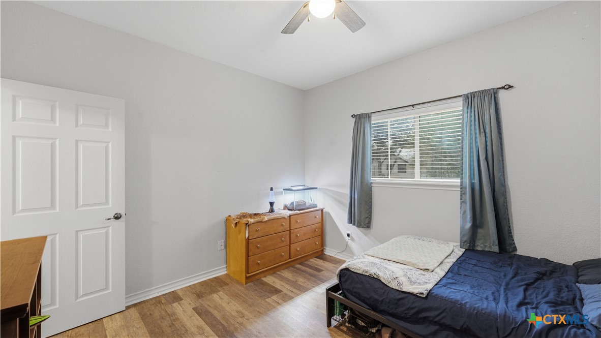 2216 Hornsby Spring Branch, TX 78070 - Photo 21 of 33 a living room with furniture and a window