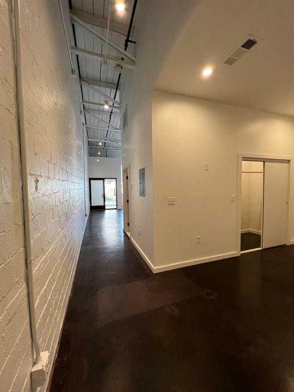 3012 Clover Street, Unit 101 Dallas, TX 75226 - Photo 13 of 15 a view of a hallway with wooden floor