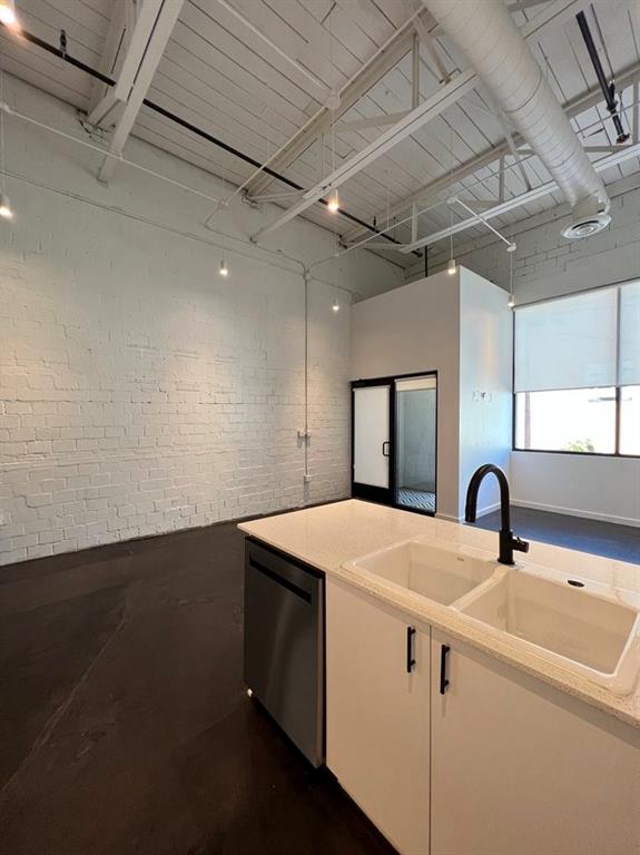 3012 Clover Street, Unit 101 Dallas, TX 75226 - Photo 7 of 15 a utility room with dryer and washer