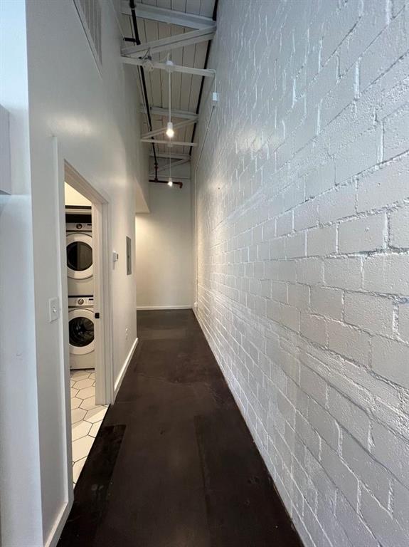 3012 Clover Street, Unit 101 Dallas, TX 75226 - Photo 8 of 15 a view of a hallway with wooden floor and a ceiling fan