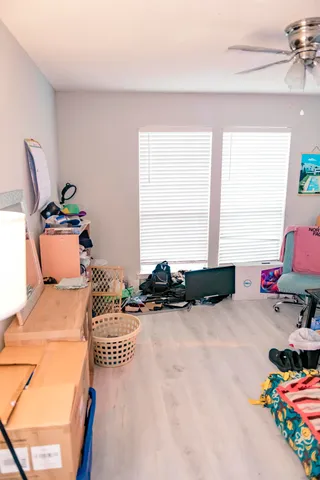 a bedroom with furniture and a bed