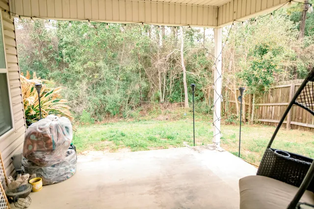 a house view with a garden space