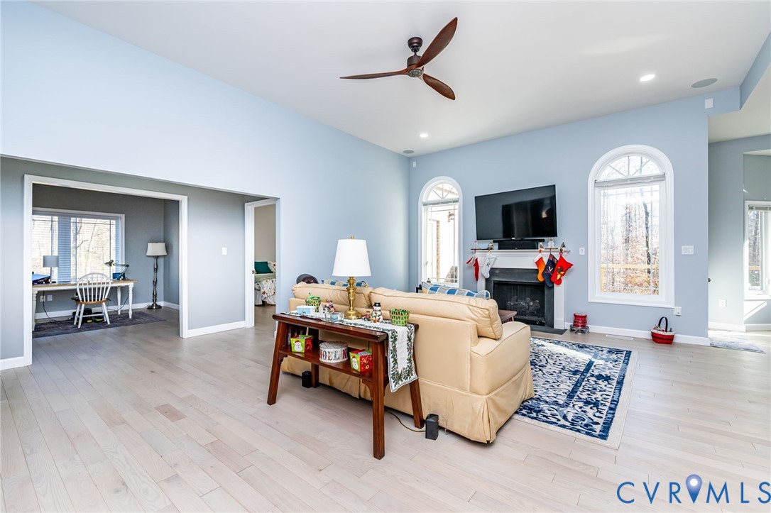 11534 Georgetown Road Mechanicsville, VA 23116 - Photo 11 of 37 a living room with furniture and a flat screen tv