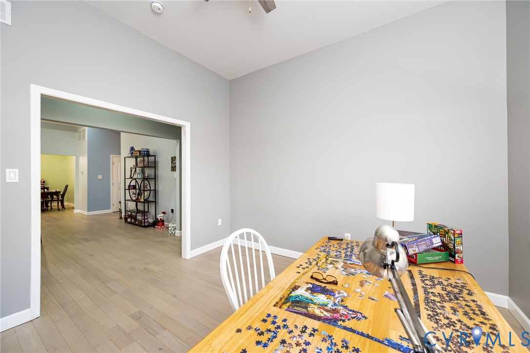 11534 Georgetown Road Mechanicsville, VA 23116 - Photo 15 of 37 a bed room with a bed and a chair