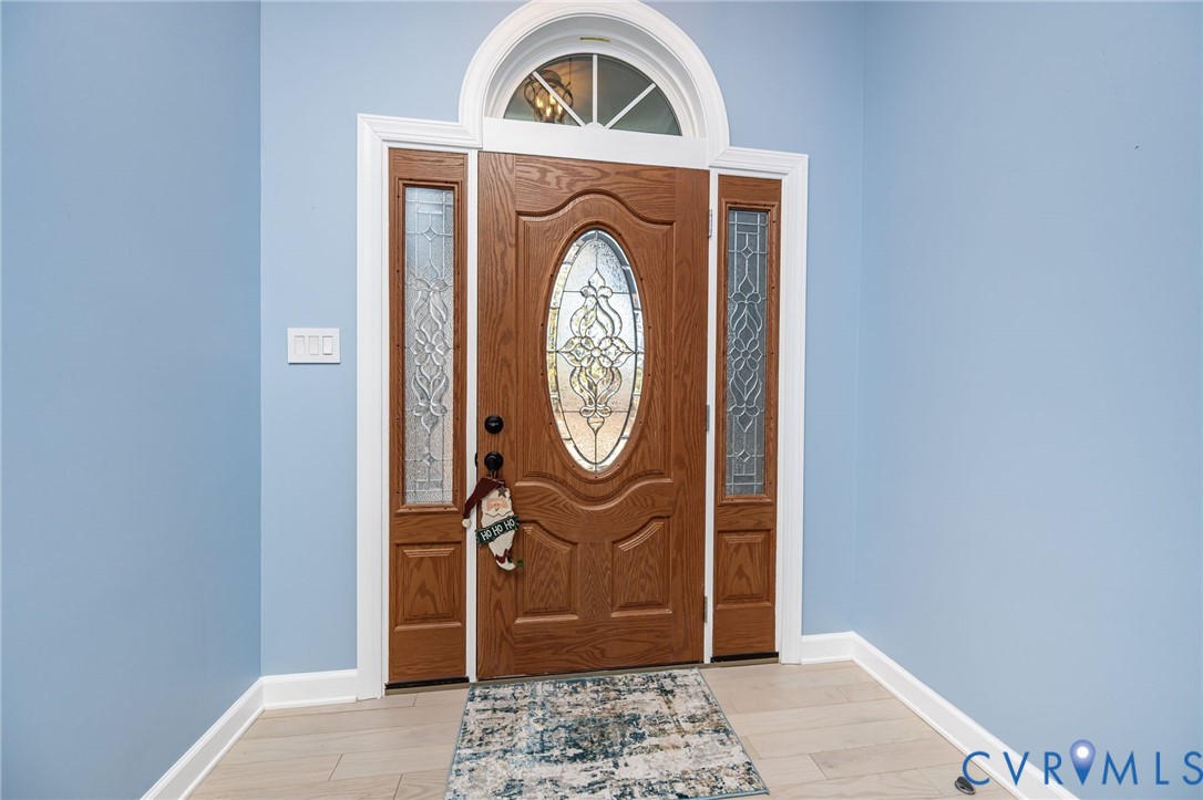11534 Georgetown Road Mechanicsville, VA 23116 - Photo 5 of 37 a front view of a house with garden