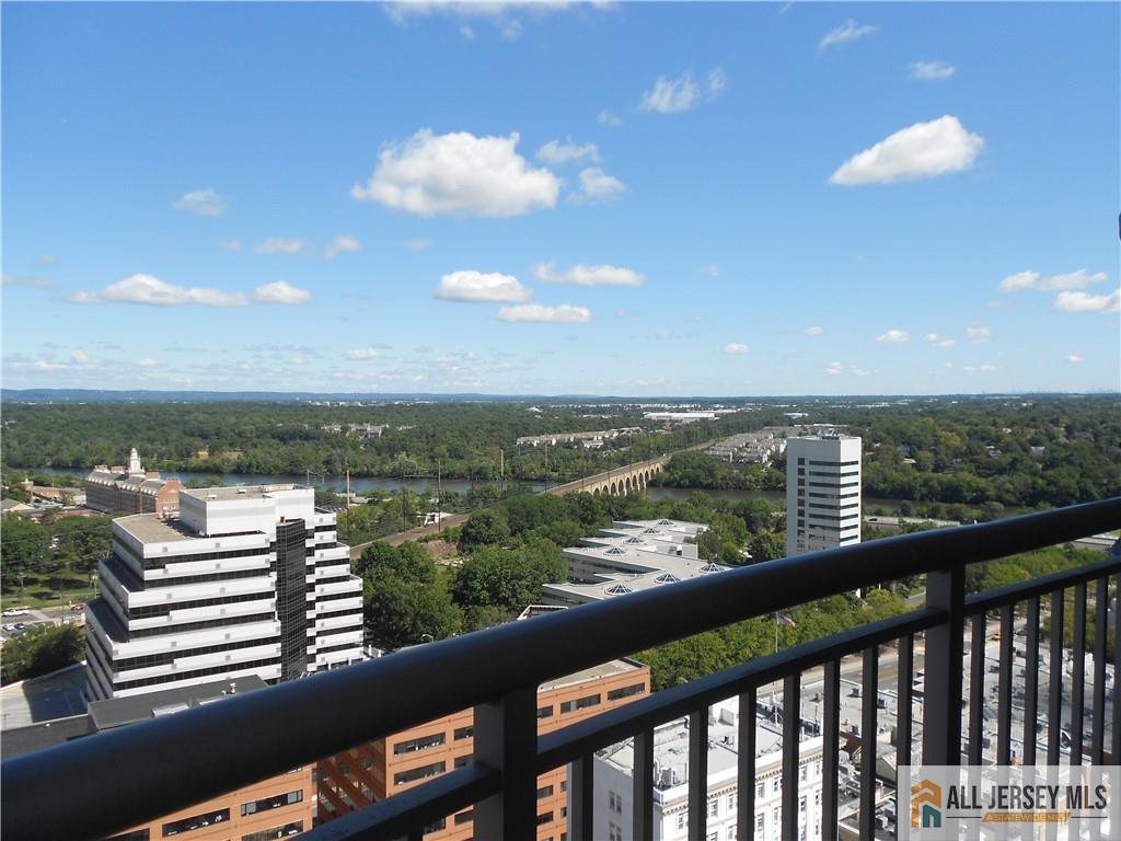 1 Spring Street, Unit 2305 New Brunswick, NJ 08901 - Photo 6 of 29 a view of city and balcony