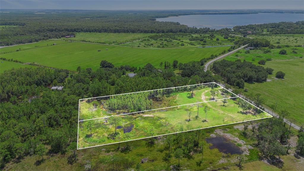 4365 Lake Gentry Road St. Cloud, FL 34772 - Photo 2 of 10 a view of a tennis court