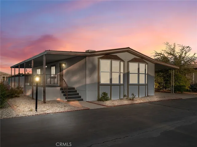 a view of a house with a street