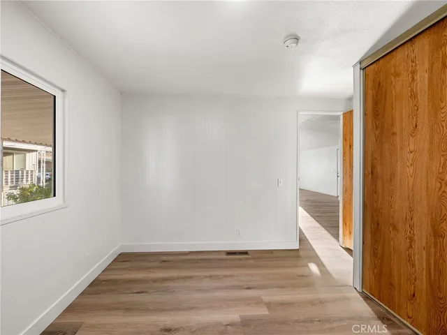 a view of an empty room and window