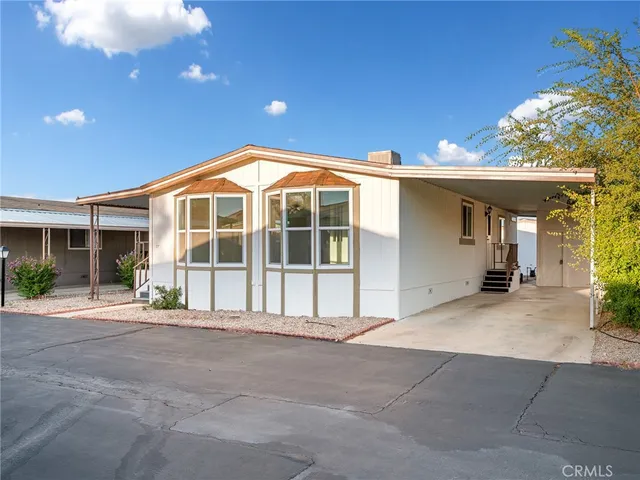 a front view of a house with a porch