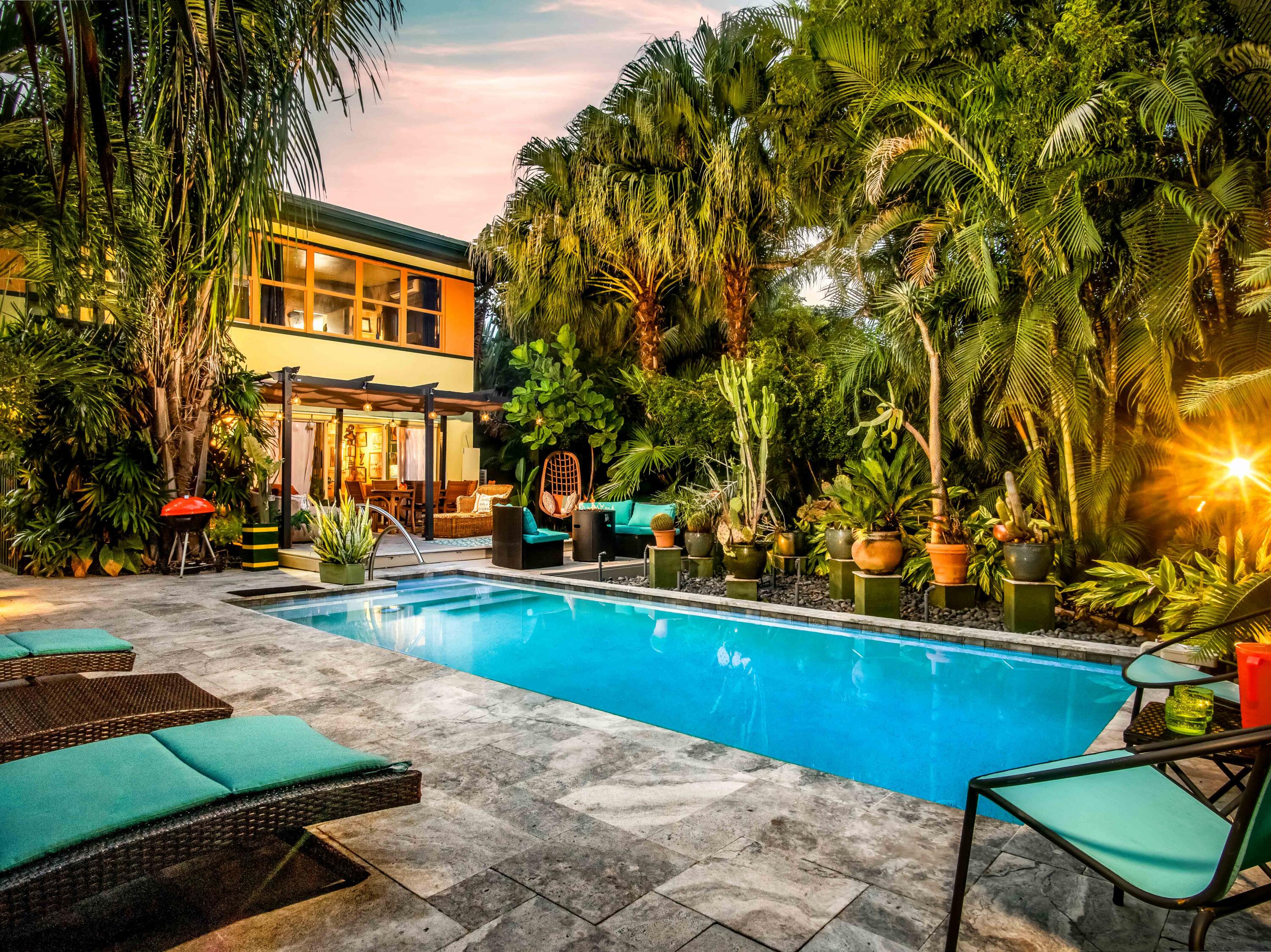 1519 Florida Street Key West, FL 33040 - Photo 13 of 86 a view of a swimming pool with lounge chair