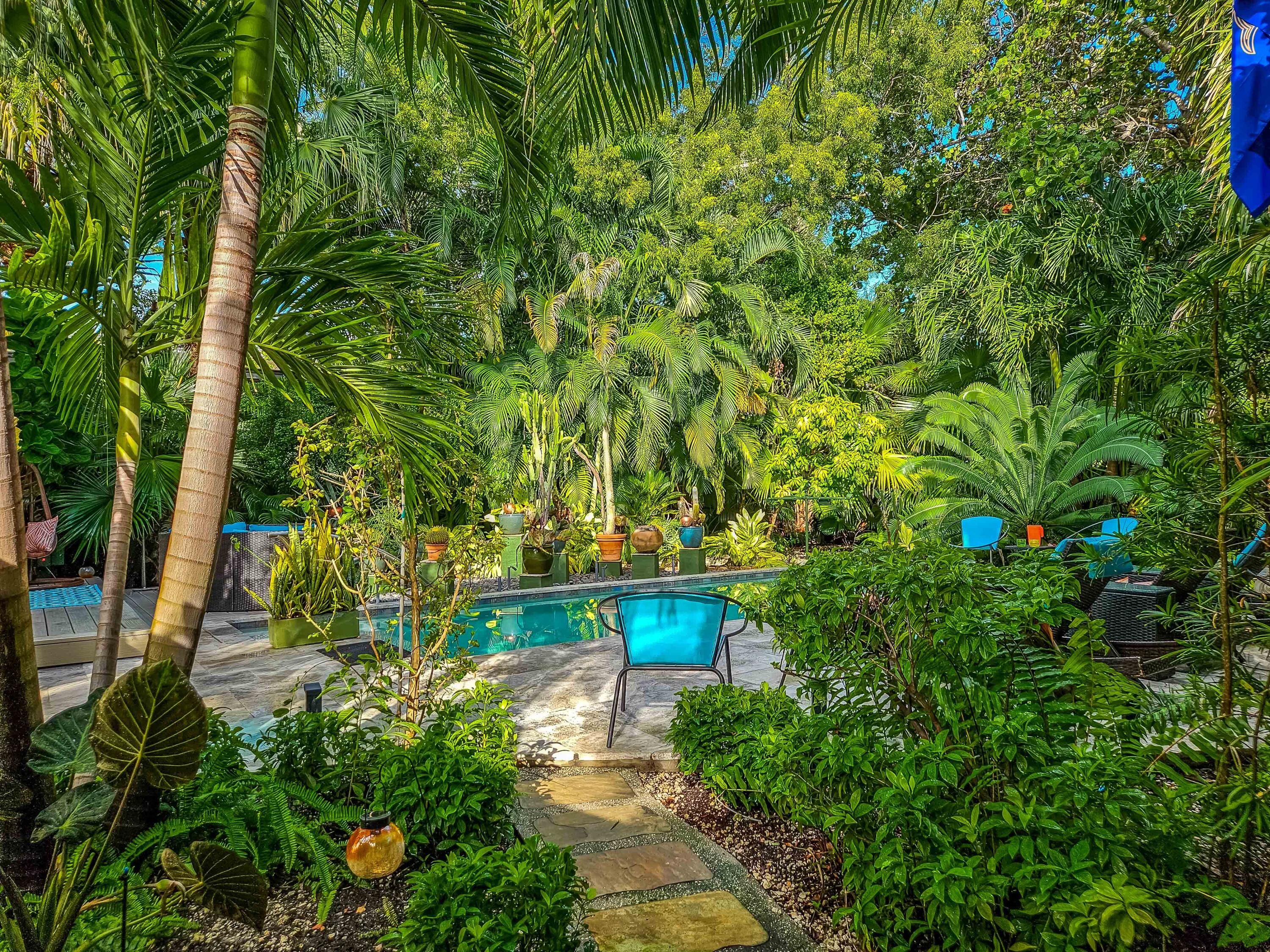 1519 Florida Street Key West, FL 33040 - Photo 14 of 86 a backyard of a house with lots of green space