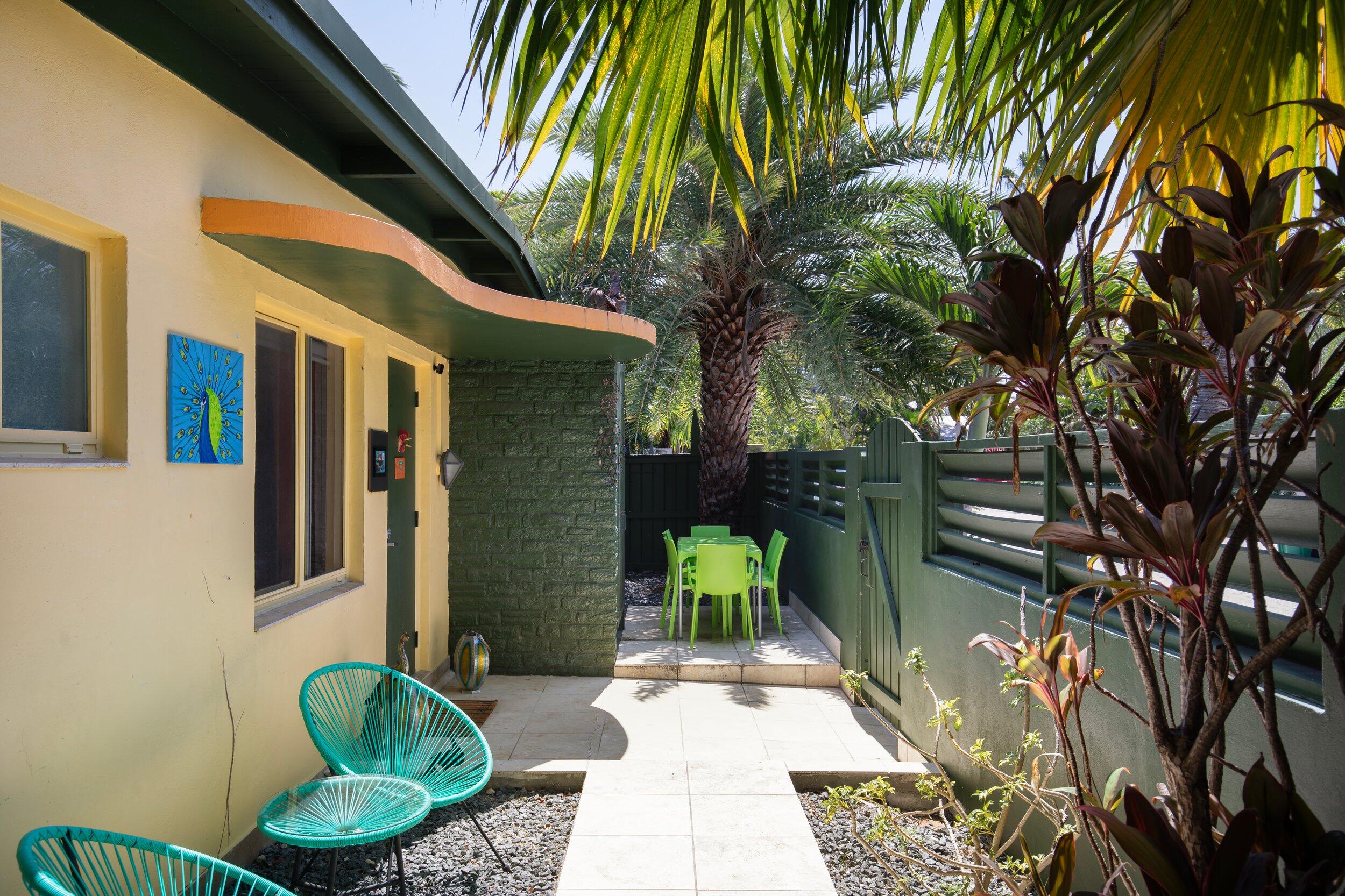 1519 Florida Street Key West, FL 33040 - Photo 47 of 86 a backyard of a house with seating space