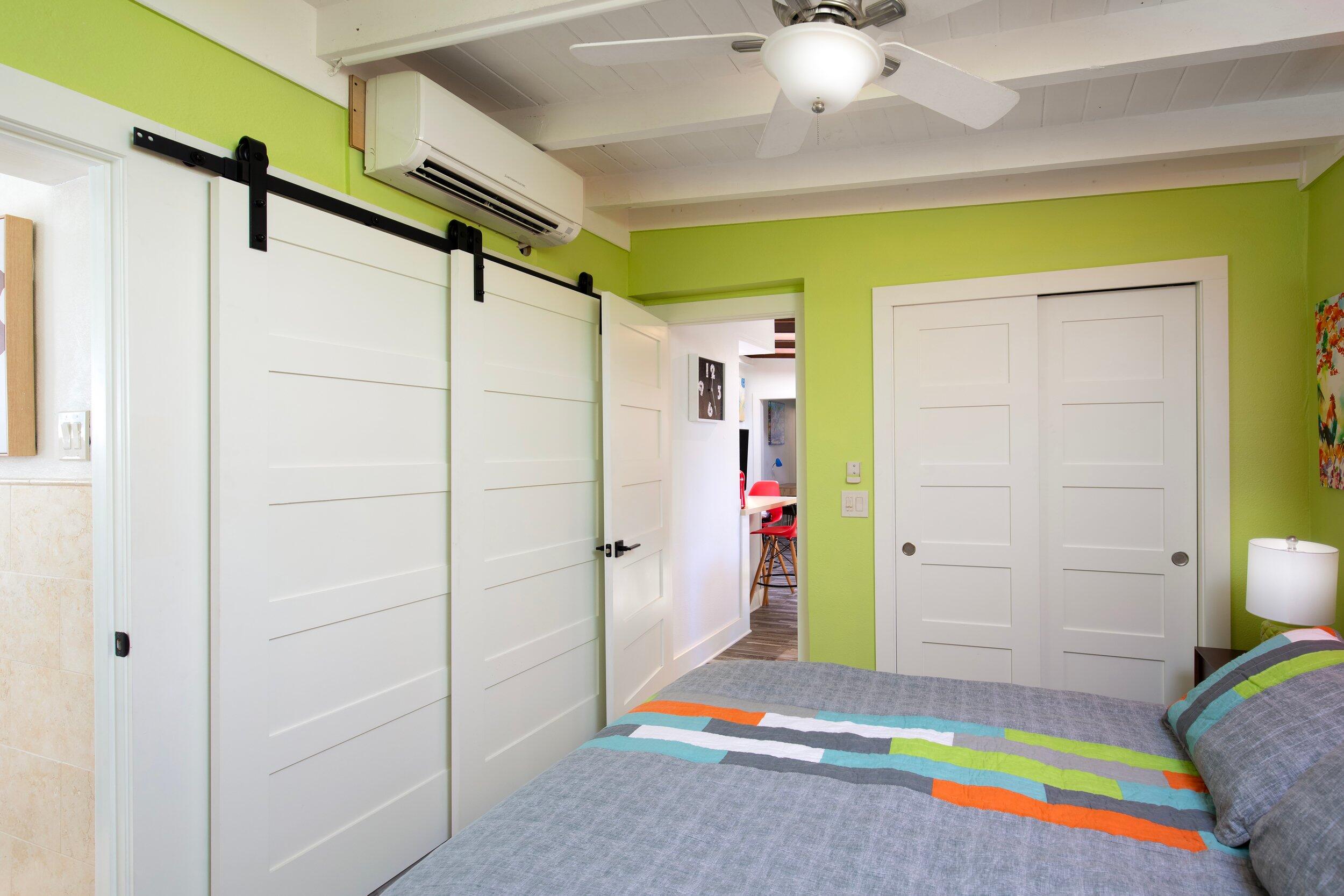 1519 Florida Street Key West, FL 33040 - Photo 75 of 86 a room that has a bed and a chandelier