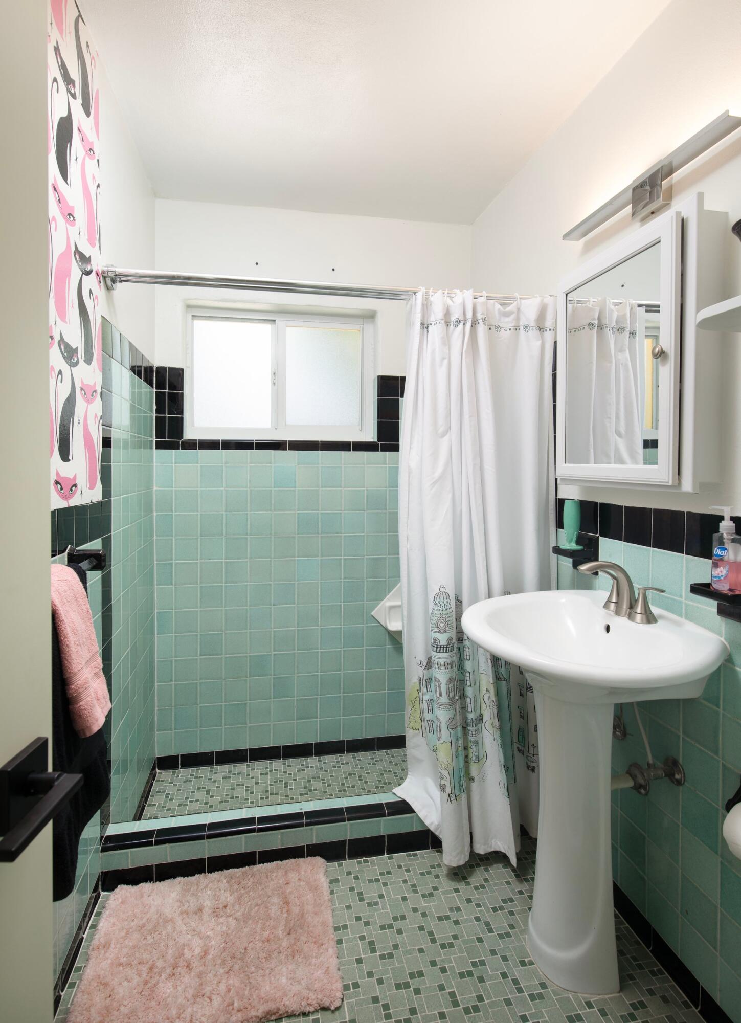 1519 Florida Street Key West, FL 33040 - Photo 79 of 86 a bathroom with a sink and a mirror