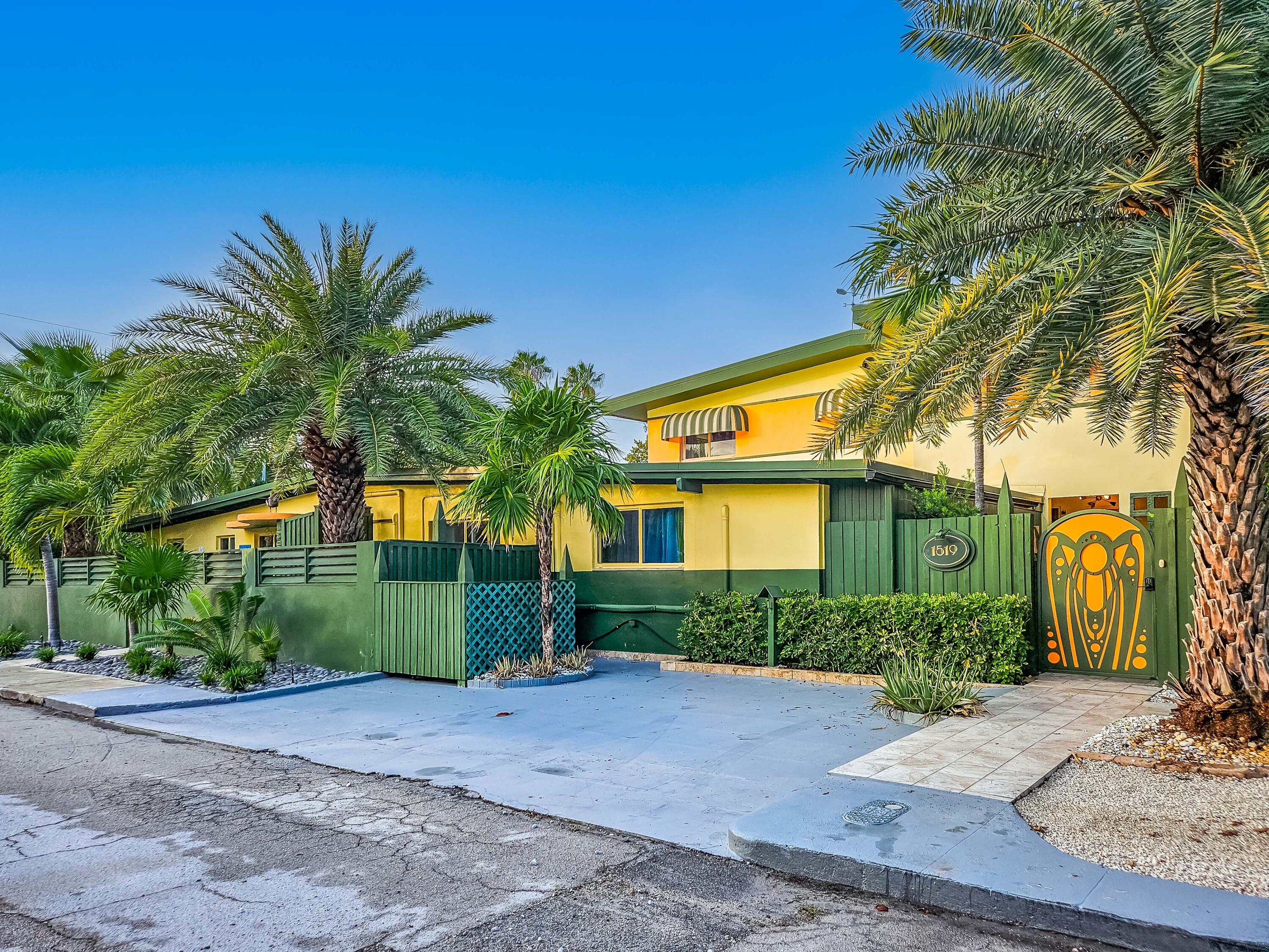 1519 Florida Street Key West, FL 33040 - Photo 86 of 86 a front view of a house with a yard and garage