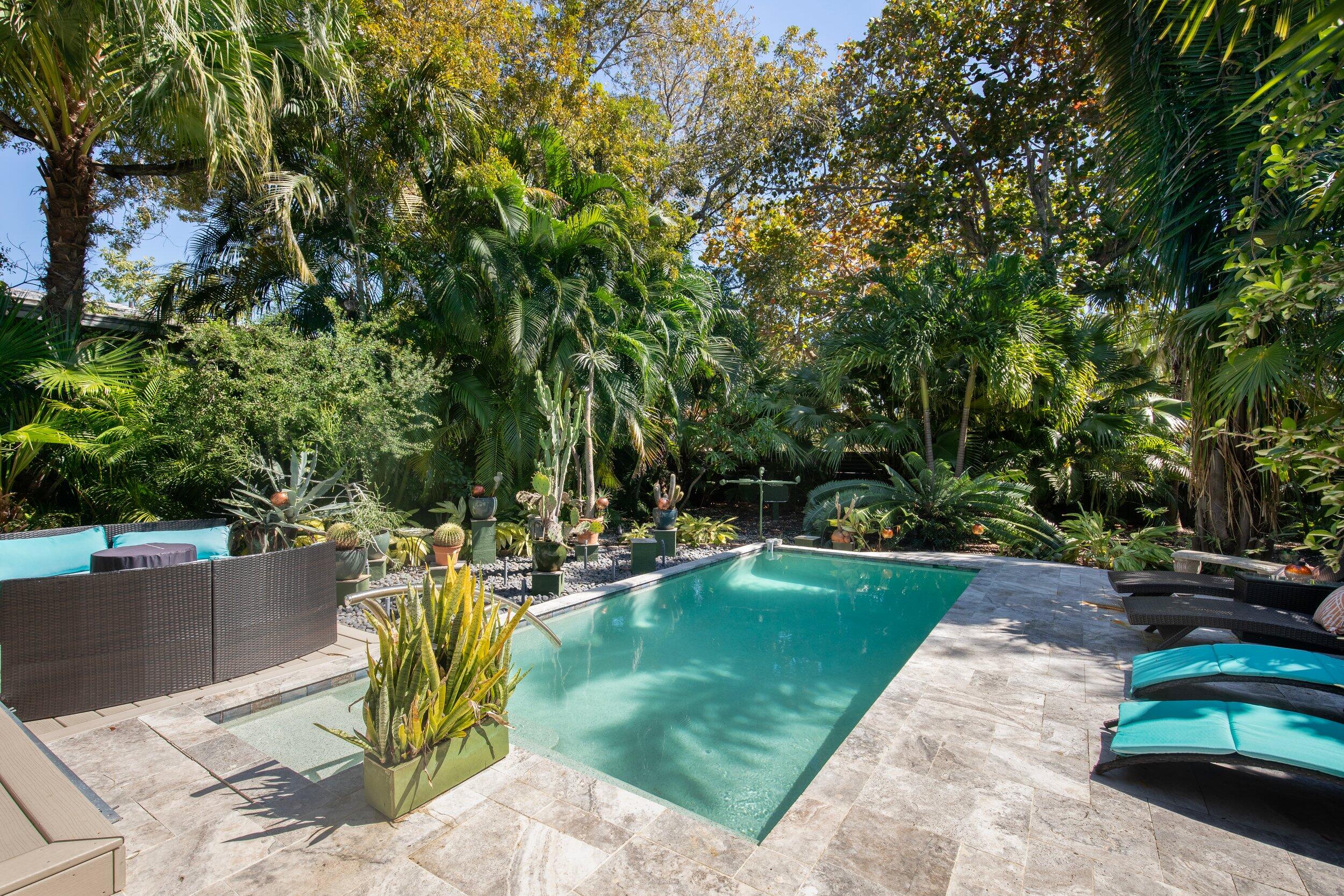 1519 Florida Street Key West, FL 33040 - Photo 9 of 86 a view of a backyard with plants and swimming pool