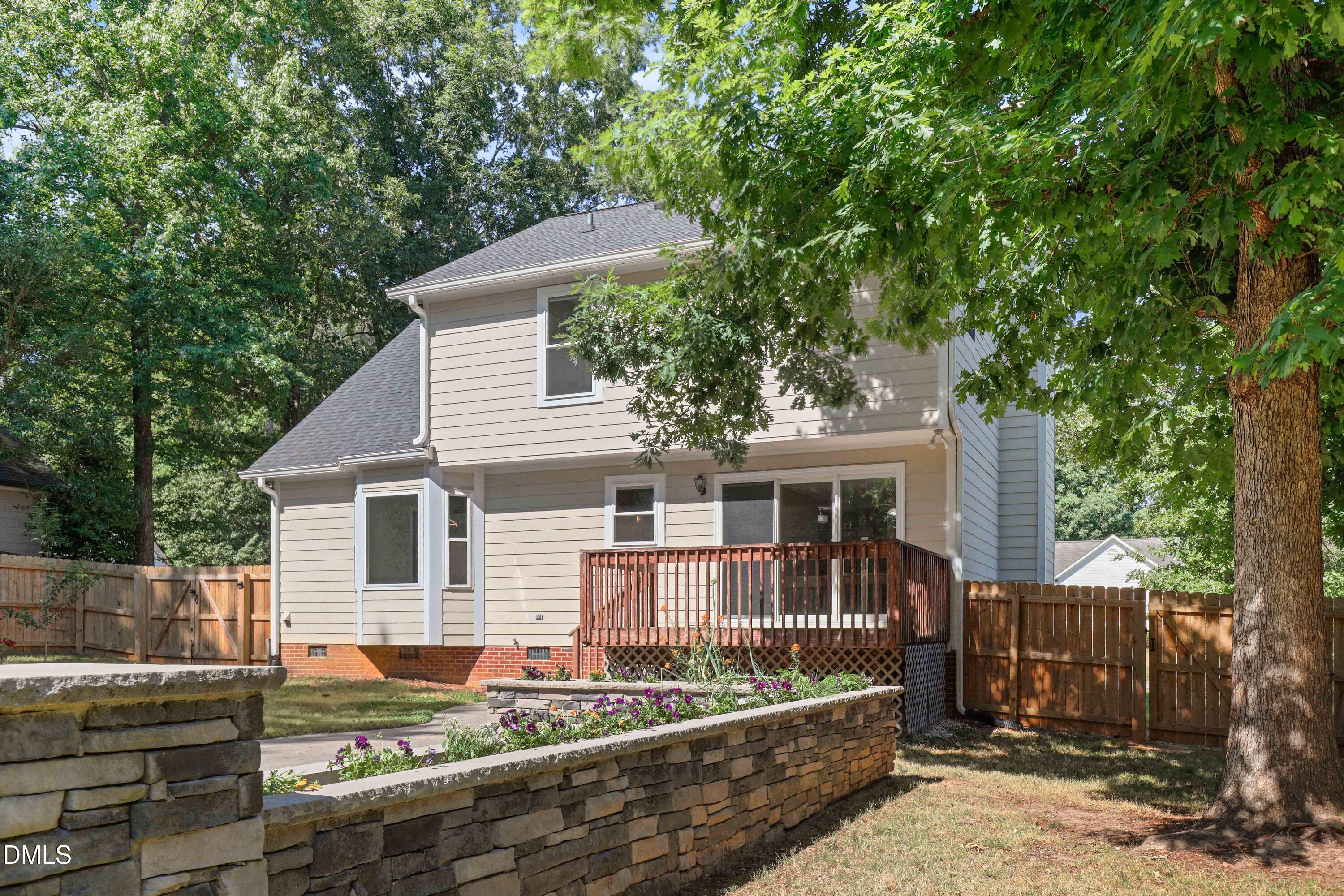 3015 Rennit Court Raleigh, NC 27603 - Photo 35 of 40 a view of house with trees in the background