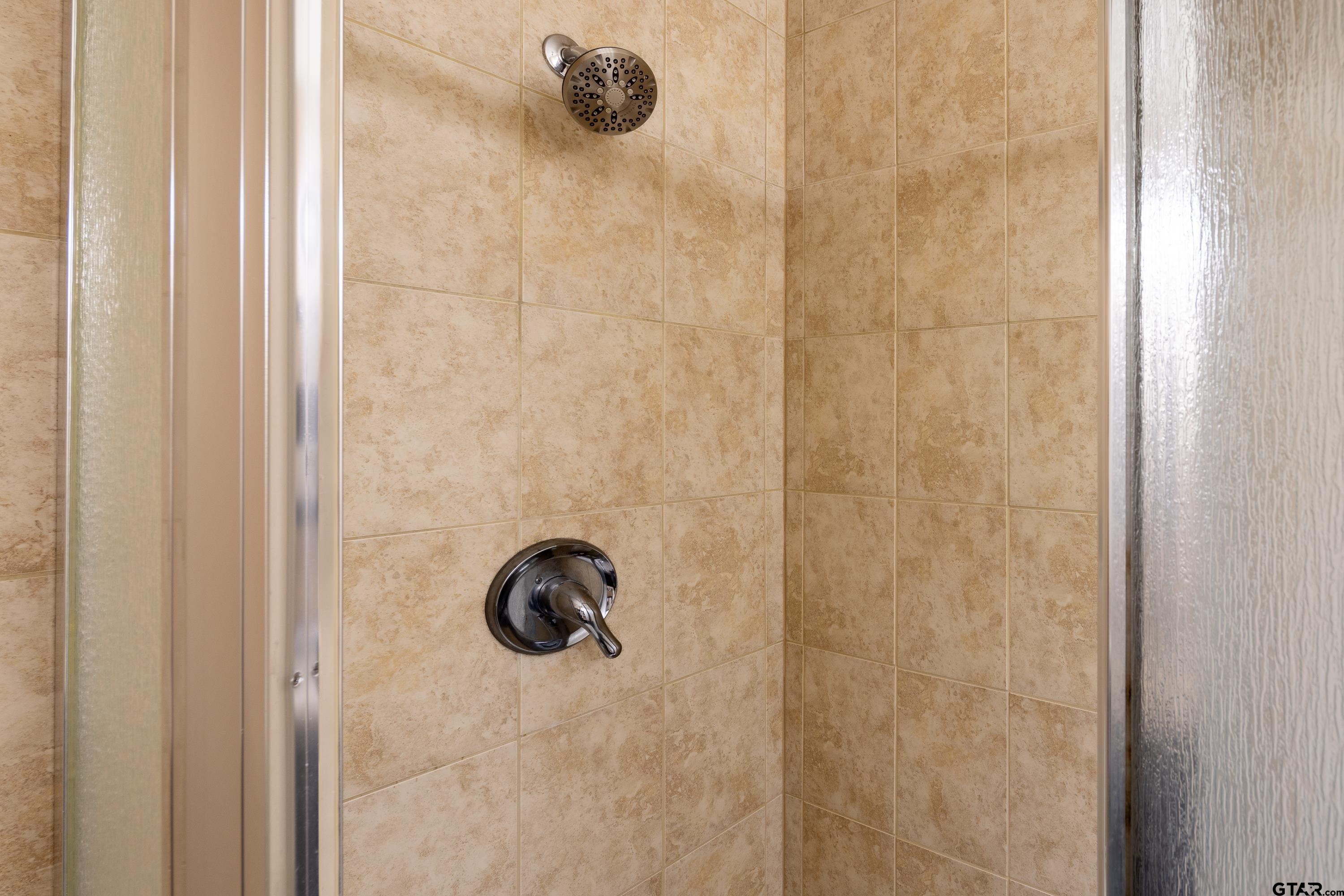 2900 West Azalea Drive Tyler, TX 75701 - Photo 23 of 37 a bathroom with a shower