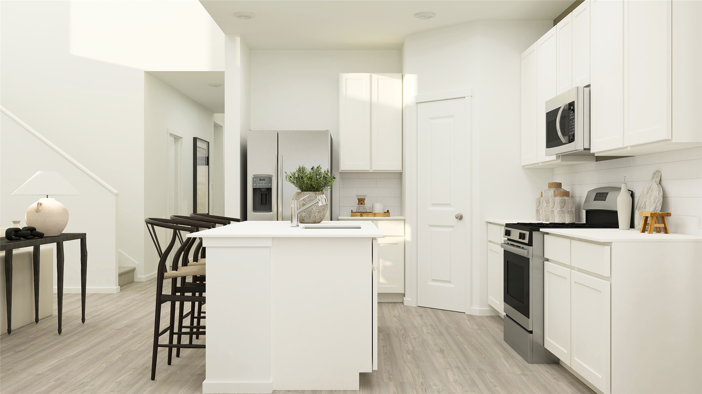 17915 Nashville Warbler Road Pflugerville, TX 78660 - Photo 15 of 25 a kitchen with kitchen island a stove a sink and a refrigerator with wooden floor