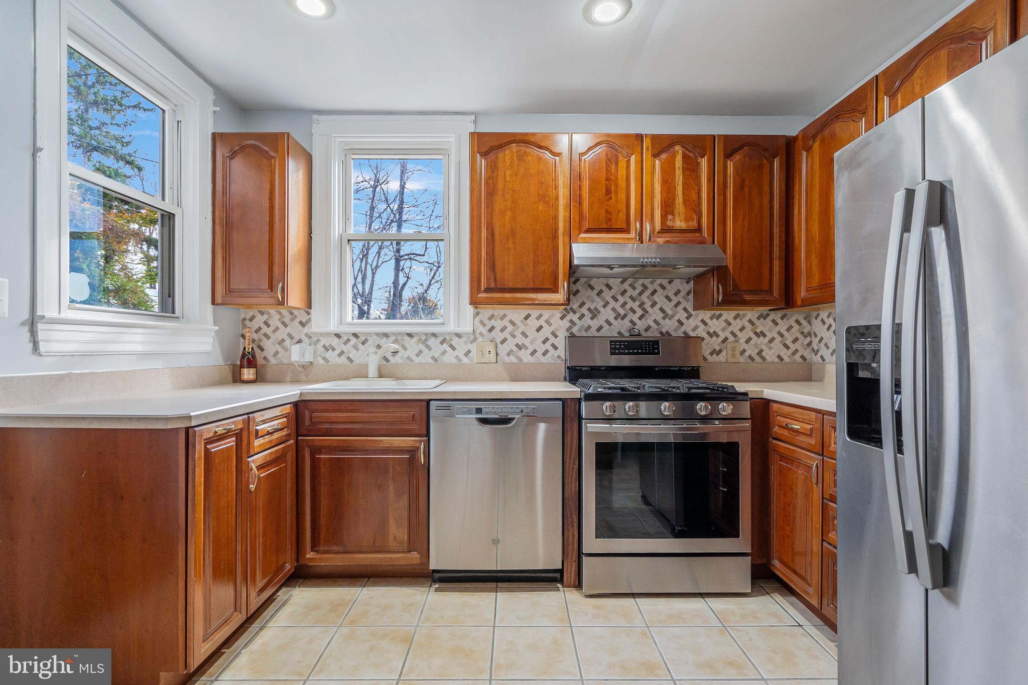 Sunny Kitchen with Stainless Steel Appliances