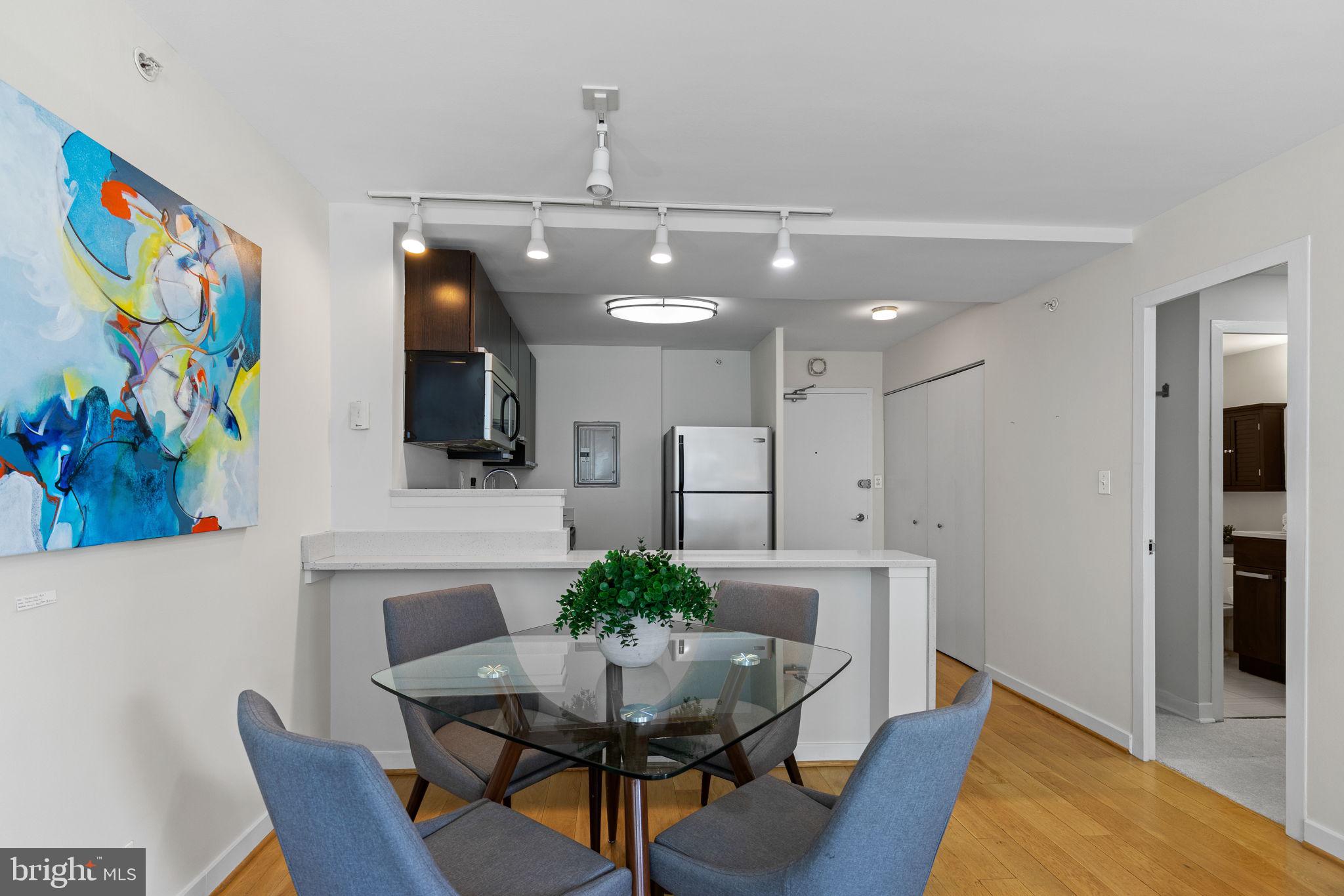 1101 3rd Street Southwest, Unit 312 Washington, DC 20024 - Photo 10 of 48 Sunny, open living area w hardwoods & huge windows
