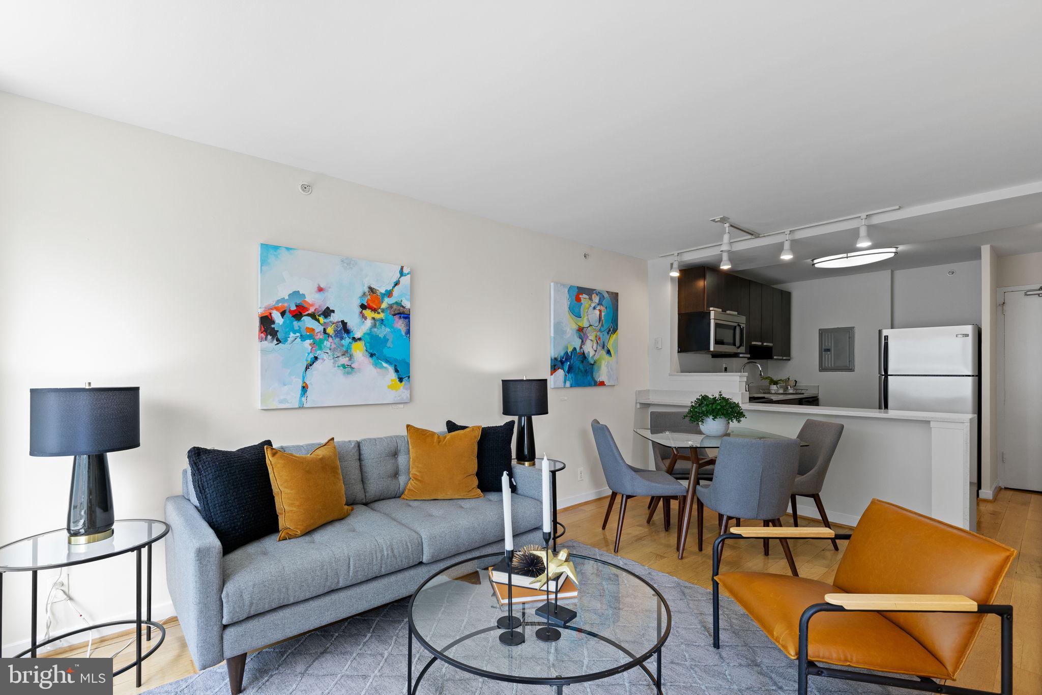1101 3rd Street Southwest, Unit 312 Washington, DC 20024 - Photo 14 of 48 Sunny, open living area w hardwoods & huge windows