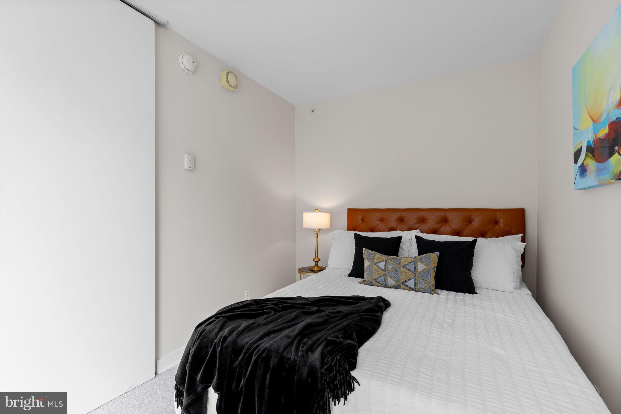 1101 3rd Street Southwest, Unit 312 Washington, DC 20024 - Photo 17 of 48 Bedroom w floor to ceiling windows & new carpet!