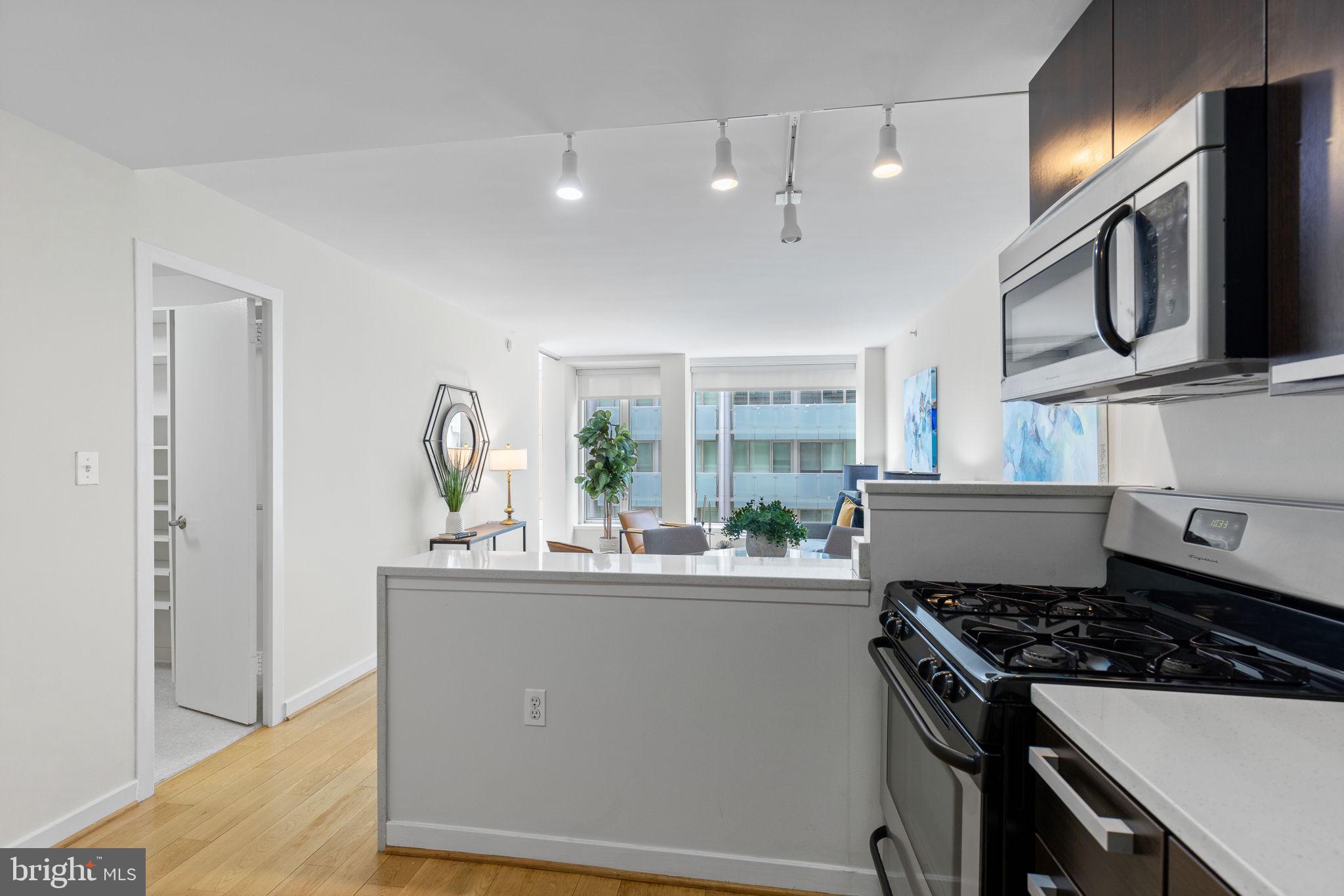 1101 3rd Street Southwest, Unit 312 Washington, DC 20024 - Photo 9 of 48 Open kitchen w granite, stainless & breakfast bar