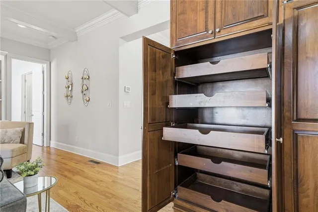 a kitchen with stainless steel appliances granite countertop a stove and a sink