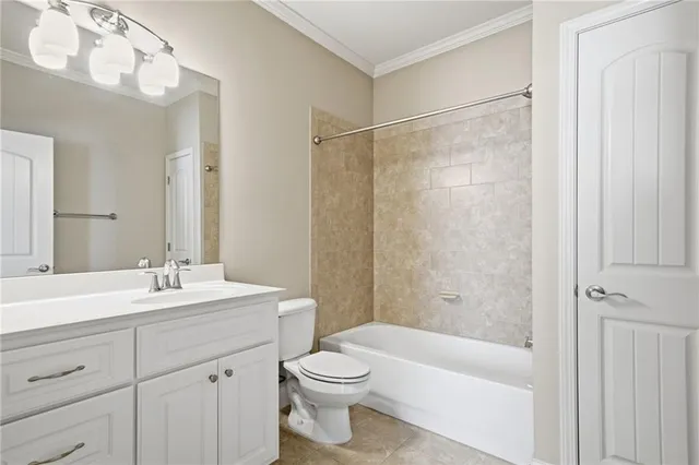 a bathroom with a sink a shower and a mirror