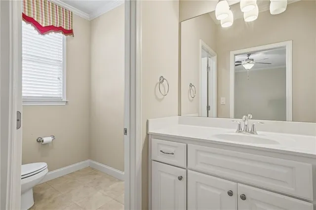 an empty room with a empty space and a ceiling fan