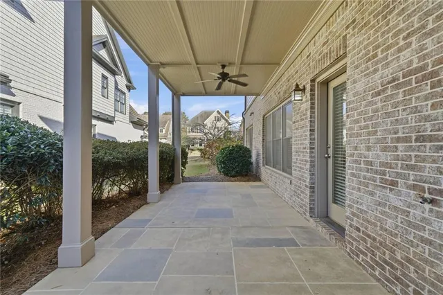 an aerial view of a house with a swimming pool
