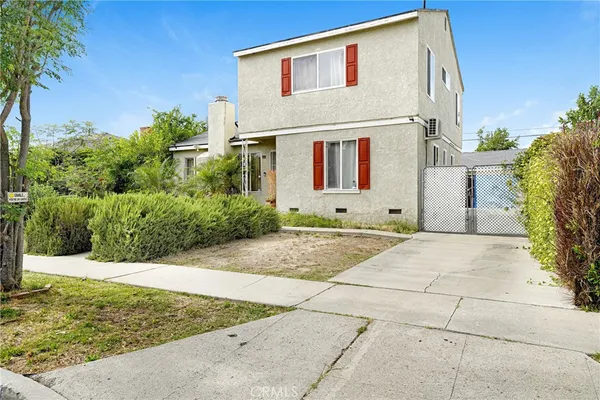 a front view of house with yard