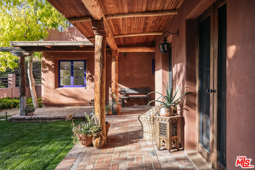 4342 Bakman Avenue Studio City, CA 91602 - Photo 2 of 31 a front view of a house with garden