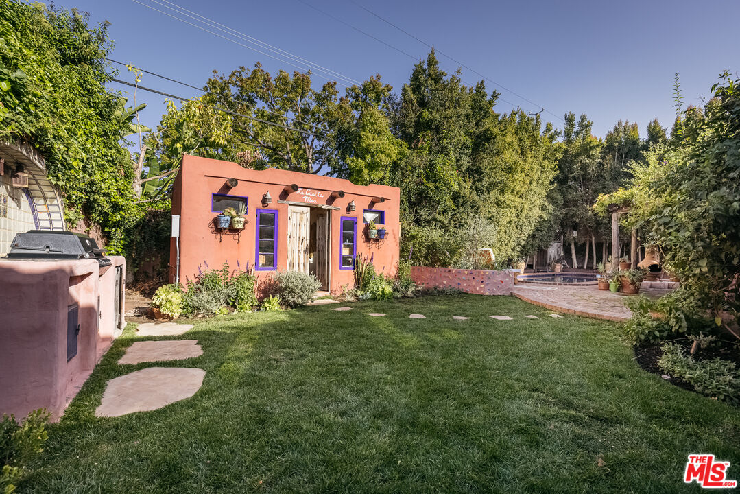 4342 Bakman Avenue Studio City, CA 91602 - Photo 25 of 31 front view of a house with a yard