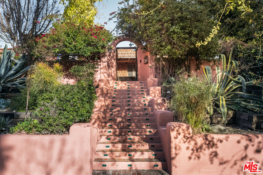 4342 Bakman Avenue Studio City, CA 91602 - Photo 30 of 31 a front view of a house with a tree