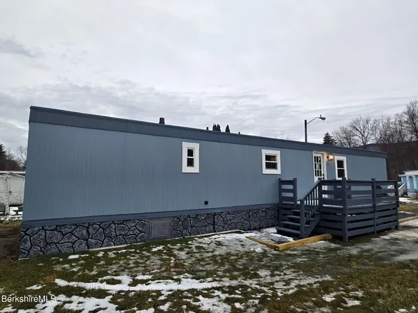a view of a house with a big yard