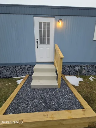 a bathroom with a tub and shower