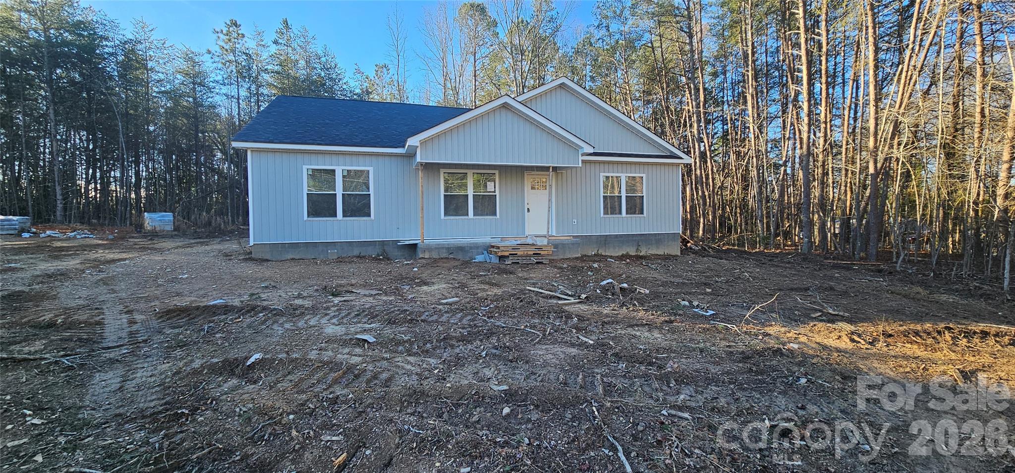 294 Zion Church Road Clover, SC 29710 - Photo 1 of 11 a house with trees in the background
