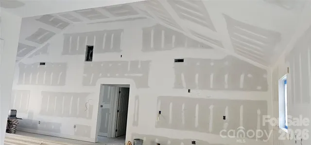 a view of a entryway with white walls