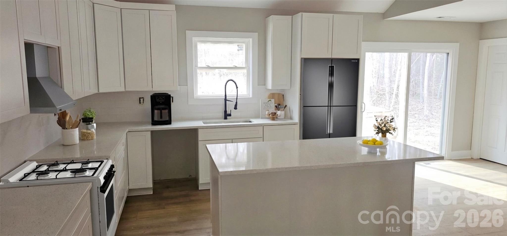 294 Zion Church Road Clover, SC 29710 - Photo 8 of 20 a kitchen with stainless steel appliances granite countertop a refrigerator a stove and a sink