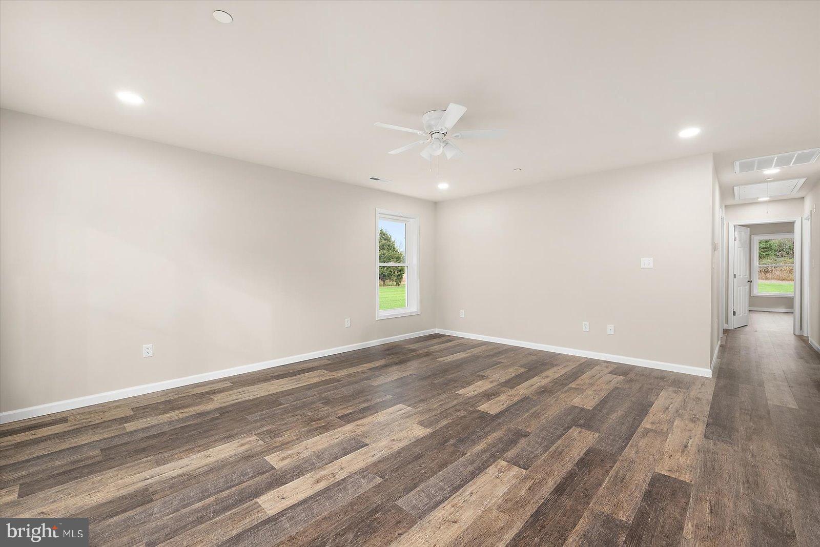 3963 Disharoon Road Eden, MD 21822 - Photo 13 of 61 an empty room with wooden floor and windows