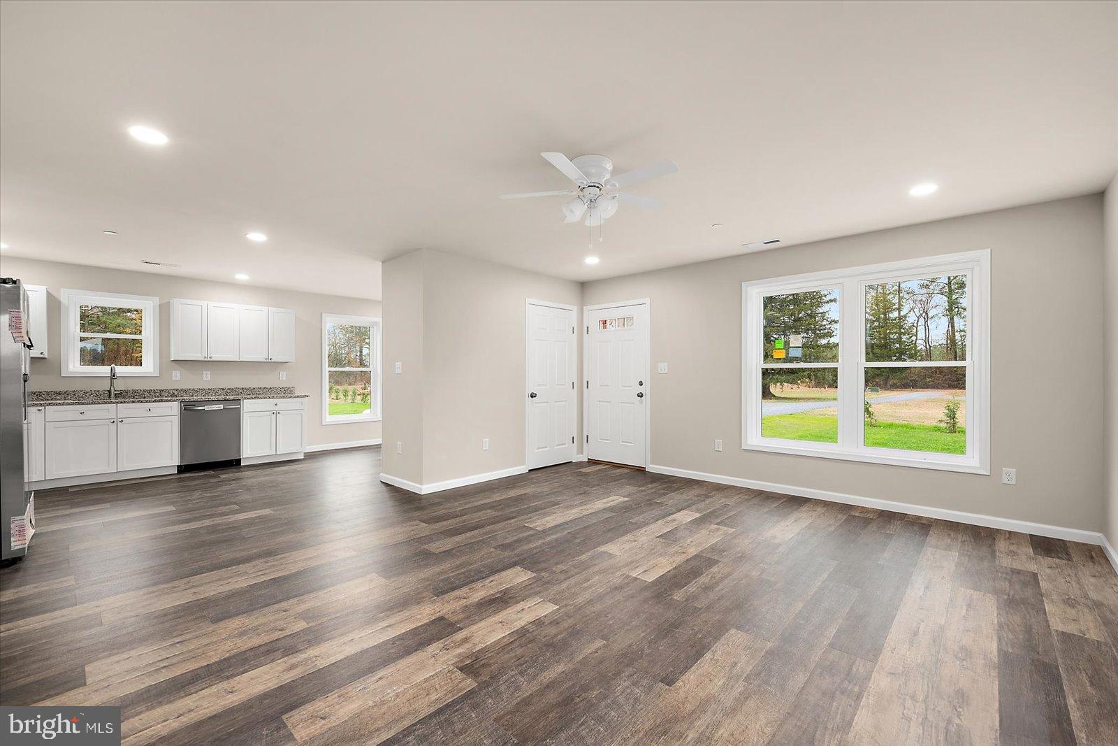 3963 Disharoon Road Eden, MD 21822 - Photo 15 of 61 a view of an empty room with window and wooden floor