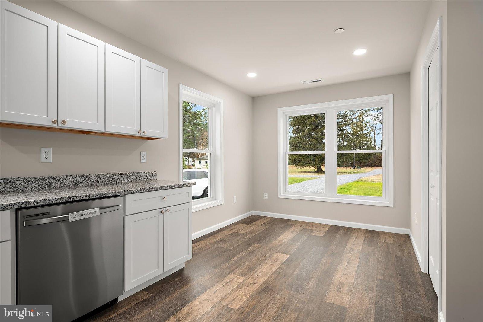 3963 Disharoon Road Eden, MD 21822 - Photo 23 of 61 a view of an empty room with wooden floor and a window
